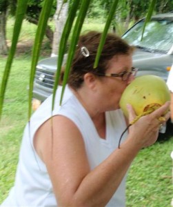 Drinking fresh coconut water in Belize