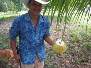 belize real estate belizean cowboy with fresh coconut water    